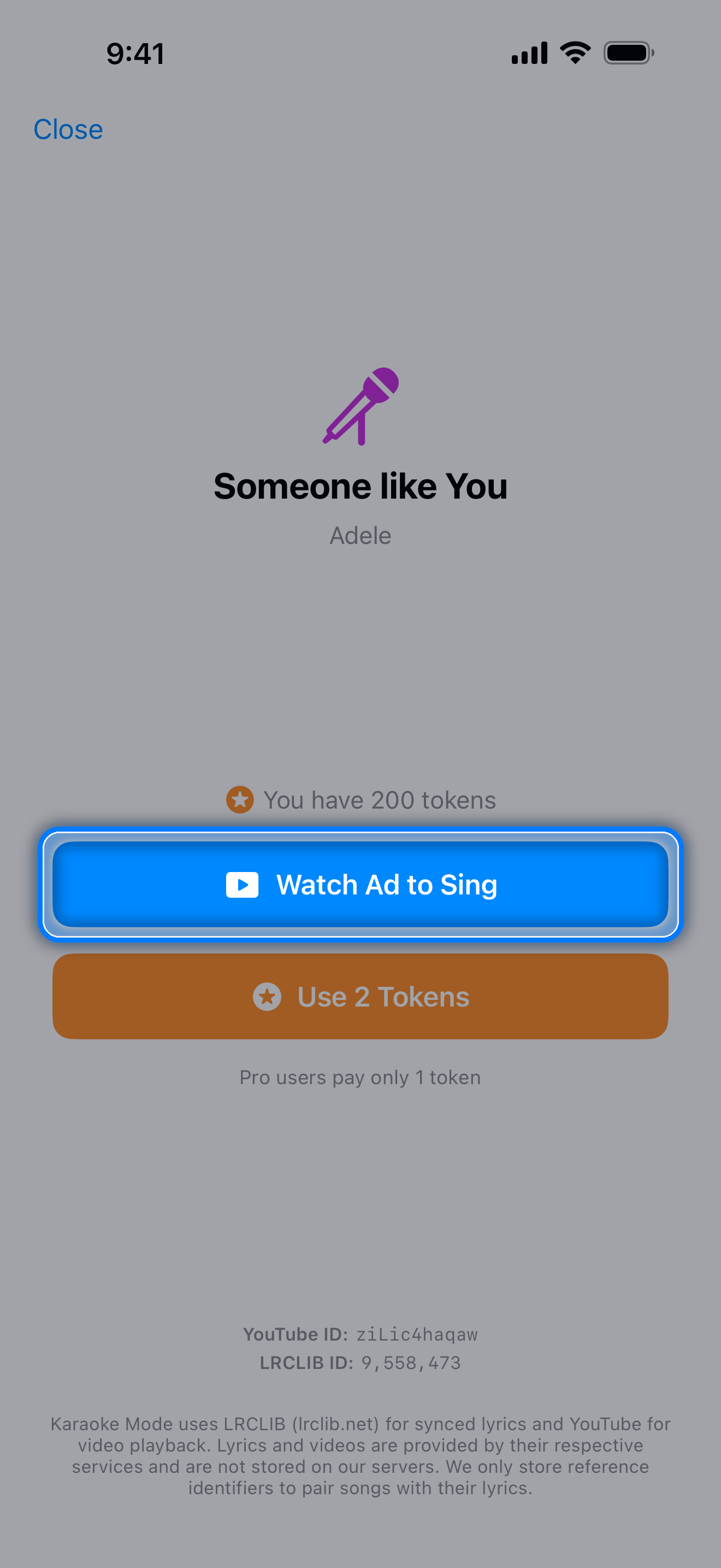 Song unlock screen with Watch Ad to Sing and Use 2 Tokens buttons